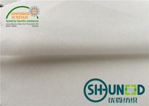 China Double Dot White Interlining Fabric Shringkage Resistant For Woven's Casual Shirt on sale