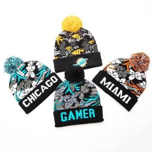 China Women Custom Jacquard Knitted Beanie Mens Pom Pom Beanies Manufacturers Supply on sale