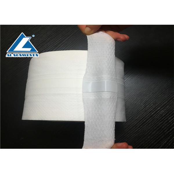 S Cut Adhesive Side Tape Non Woven Fabric Roll Diaper Raw Material Carton Packing