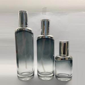 China 40ml 100ml 120ml Glass Lotion Bottle Set With Metallic Silver Shoulder on sale