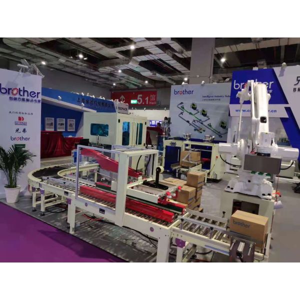 High Quality New Design Auto Strapping Low Table pp Belt Strapping Machine for Packaging Machinery