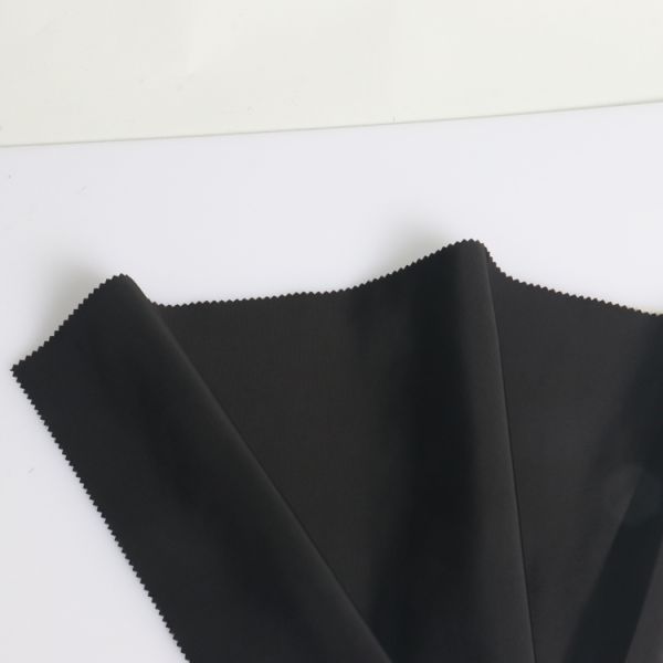 Smooth and durable windbreaker/backpack regenerated shape memory weft fabric