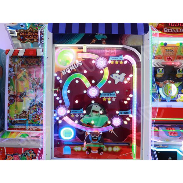 Space-themed arcade machine display with vibrant colors and LED effects