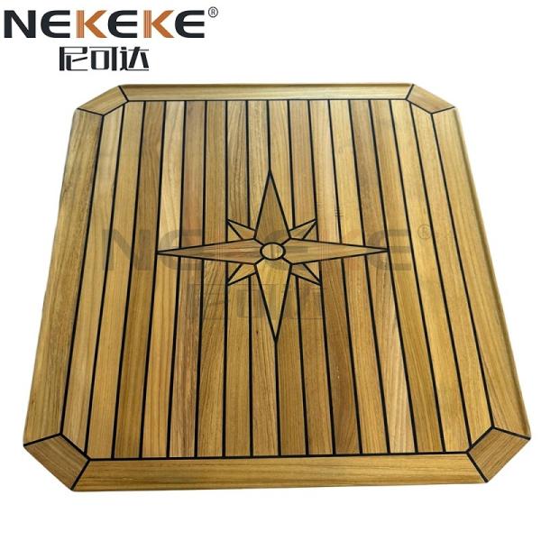 Close-up view of teak table top showing grain and craftsmanship