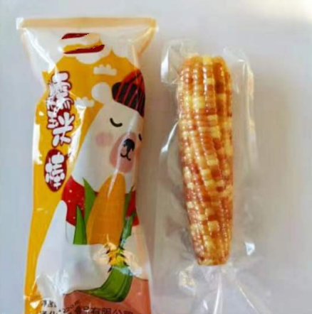 Stick Grains Fresh Sweet Corn Cutting on the Cob