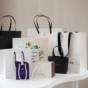 Buy cheap Custom Luxury Cosmetic Paper Bags Clothing Shopping Bags With Handles product