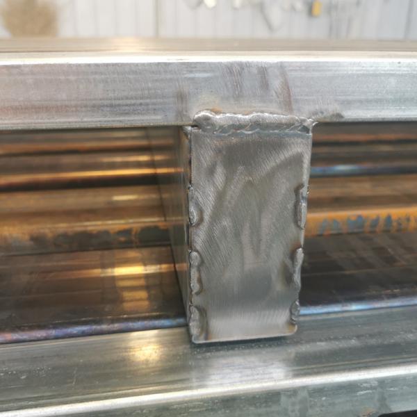 Multiple steel pallets stacked together