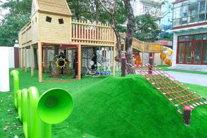 Buy cheap Kindergarten wooden tree house outdoor playground equipment with climbing net product