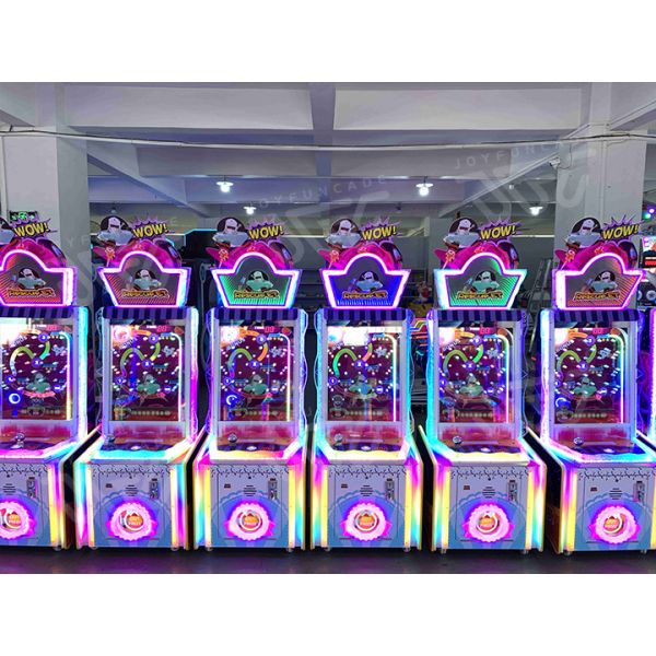 Close-up view of Rescue ET arcade machine details and lighting features