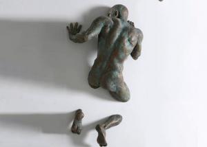 Buy cheap Life Size Patina Cast Bronze Wall Mounted Man Sculpture product