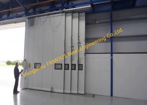 China Multi Sector Structural Folded Hinged Sliding Doors Bottom Rolling Hangar Door Smart Track Design on sale