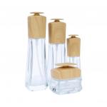 China Transparent Glass Cosmetic Bamboo Bottle Bamboo Cosmetic Jar Set With Bamboo Lids for sale