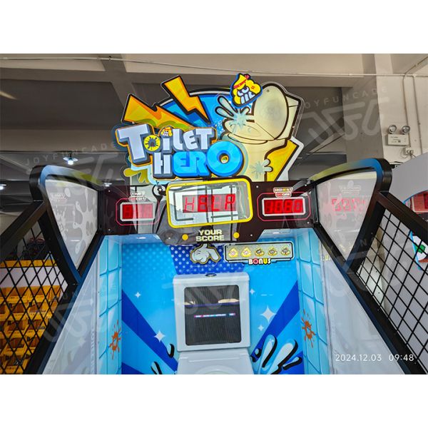 Toilet Hero arcade machine front view showing colorful design and toilet bowl targets