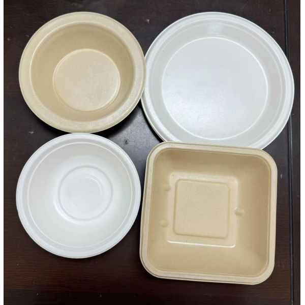 Close-up view of coating finish on pulp molded bowl and tray products