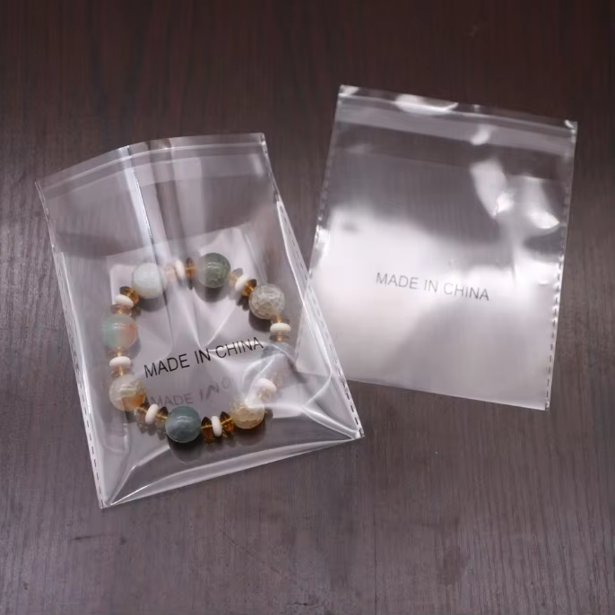 10*10CM Explosion-proof Edge Transparent Paper Self-adhesive Shrink Bags Black Gravure Printing Bag Recyclable