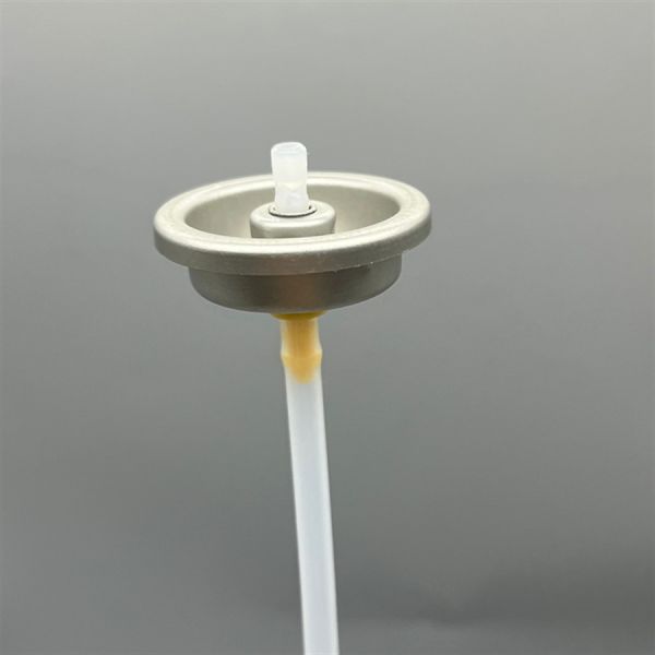 Precision dispensing aerosol valve